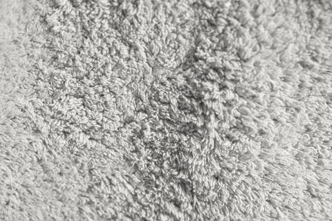 White abstract texture background, seamless pile textile, artificial soft fur