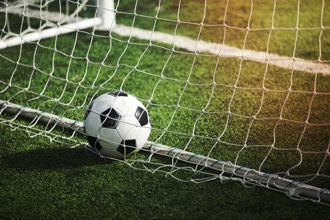 Soccer ball in gate