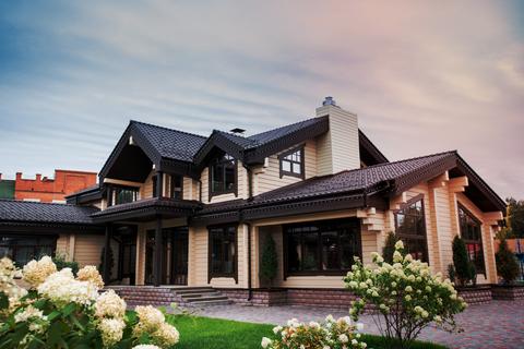 View of luxurious modern house with decorative elements around windows