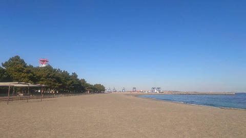 Sandy beach, sea and small waves