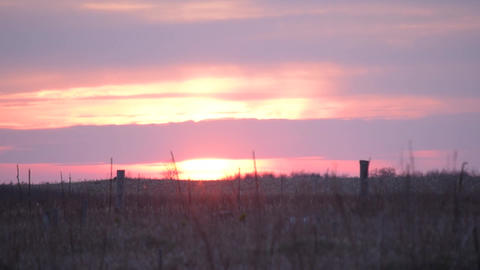 Time lapse of sunset with evening glow in the countryside