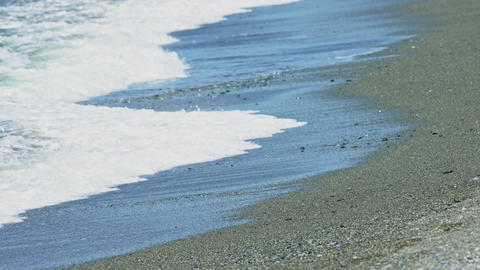 Shonan Oiso beach, waves crashing on a sunny day