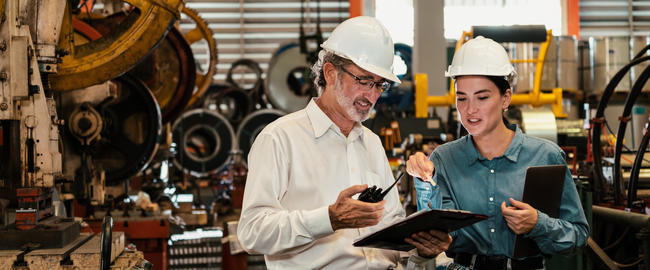 Factory engineer with assistant using laptop ins Stock photo 28214925 ...