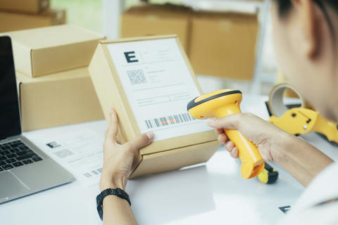 Scanning parcel barcode before shipment Stock photo 28509414 ...