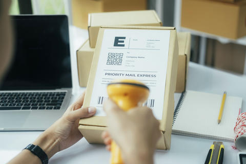 Scanning parcel barcode before shipment Stock photo 28509427 ...