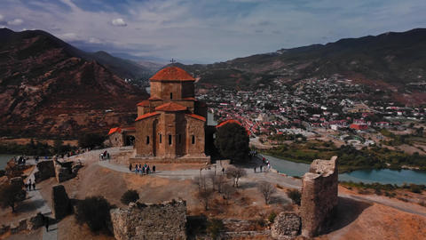 Majestic ancient Jvari Monastery built on hill in front GIF 29267447 ...