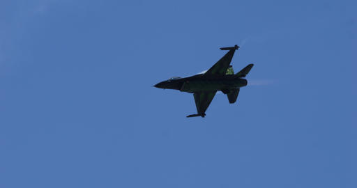 F-16 Fighter Jet Silhouette in Flight with Copy Space