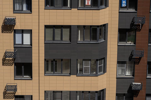 Facade of a modern residential building, building texture