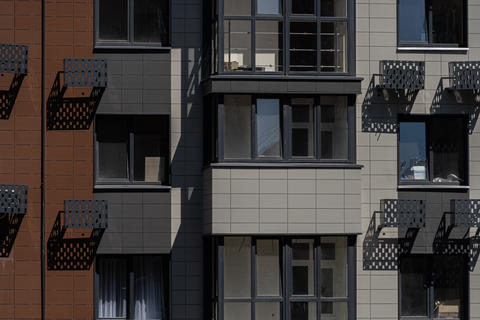 Facade of a modern residential building, building texture