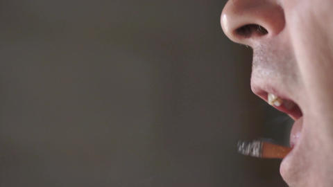 Flipping Cigarette Into Mouth