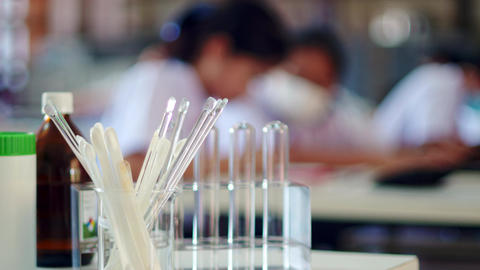 Asian high school students in a science laboratory