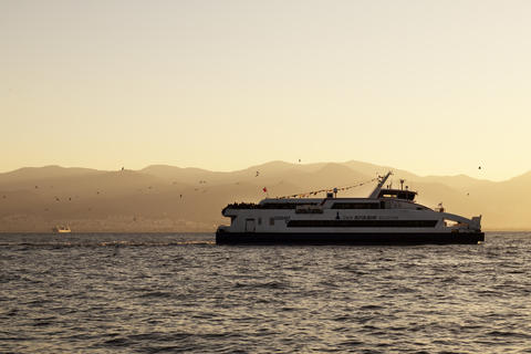 Ferry Sailing in Foggy Golden Hour