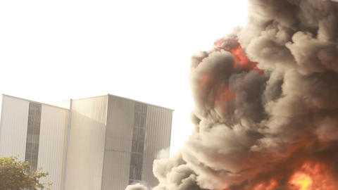 firefighters battle blaze in packaging factory