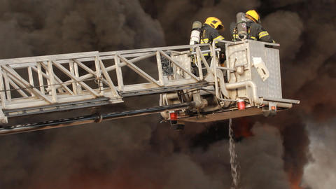 firefighters battle blaze in packaging factory