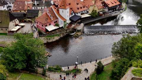 Cityscape of Krumlov with dark clouds