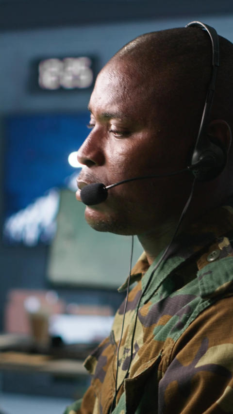 Gif vertical video military dispatcher managing communications…