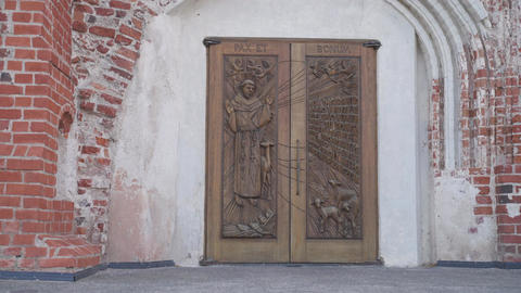 Wooden door in a brick building