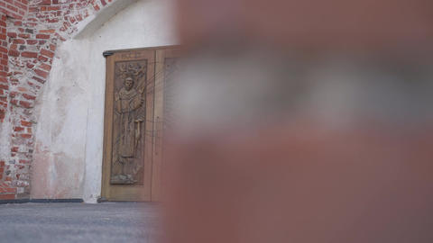 Wooden door in a brick building