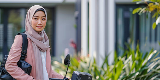 Young Woman in Hijab Leans on a Scooter