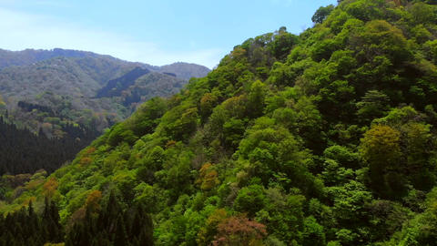 Aerial Ascent: Majestic Mountain Climb