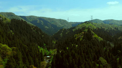 Aerial Footage: Slow Ascent Over Majestic Mountain Range
