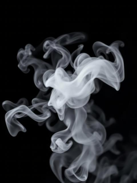 Smoke black background blur abstract fog white smoke or steam mist cloud isolated on black