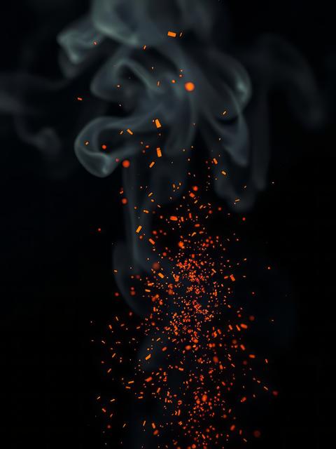 Detail of fire sparks isolated on black background Smoke Explosion Backdrop