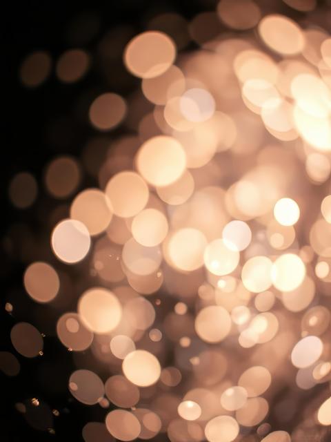 Abstract light bokeh sparks bright glitter particles or dust shine blur bling glitter dust particle