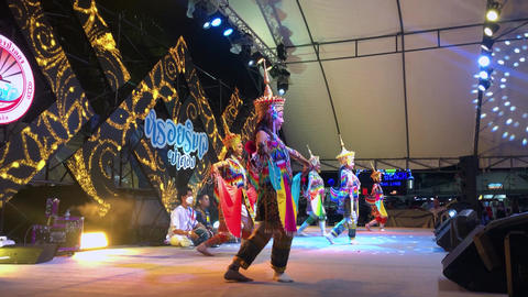Phuket, Thailand - 09 July 2022: Traditional Thai dance performance at a vibrant festival