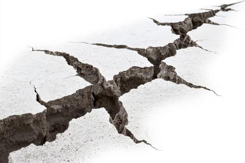 Close-up of deep crack textures and shadows isolated on white background