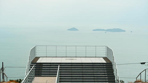 Calm sea and distant island Peaceful scenery stock footage