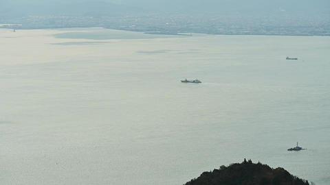 Calm sea and distant island Peaceful scenery stock footage