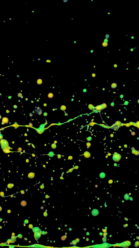 Yellow and Green Color Splash on Black Backgrou Animated GIF