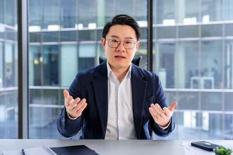Professional Businessman Discussing Ideas in a Modern Office Setting