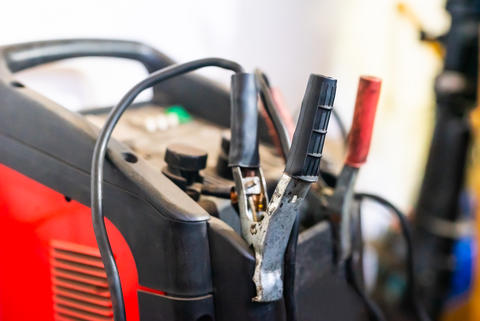 Close-up of Clamps and Welder in Auto Workshop