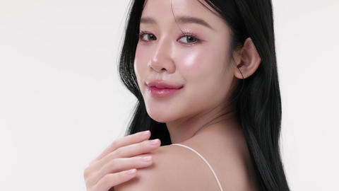 Beauty Asian woman rubbing shoulder softly over white background, Commercial beauty skin concept