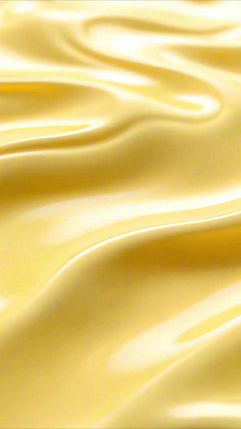 Smooth Flowing Waves of Yellow Milk Rippling in Mesmerizing Motion