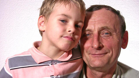 Warm smile from boy and man