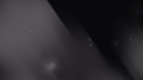 Gray and black gradients feature faint glowing particles