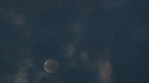 Moment of cloud through moon in the night, timelapse