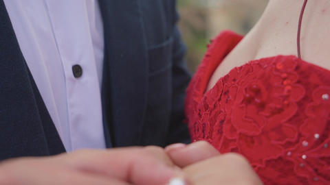 Hand with a ring. Put the ring on your finger