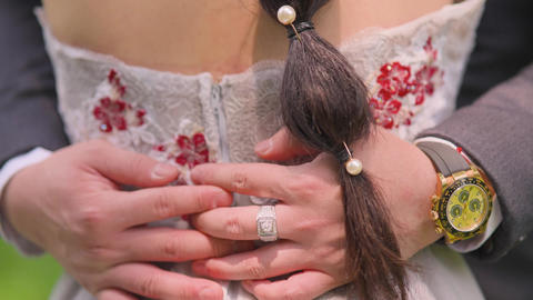 Hand with a ring. Put the ring on your finger