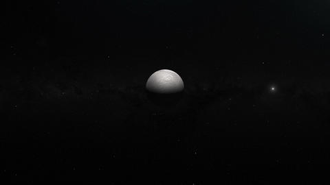 Traveling towards Rhea, Saturn's moon, in the outer space