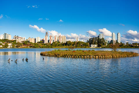 Vibrant blue water of Barigui Park lake and the Curitiba, Parana Brazil