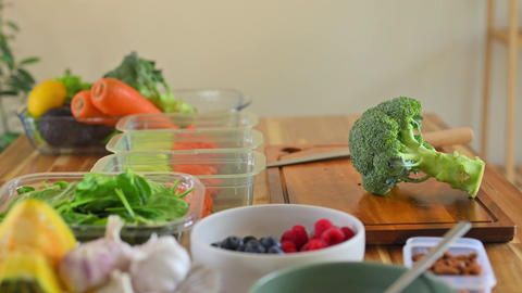 Fresh fruits and vegetables arranged on a kitchen counter for weekend meal prep