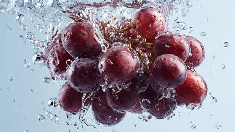 Fresh grapes grape frozen motion with one dynamic water splash