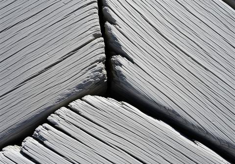Bleached weathered wood texture abstract background with geometric plank pattern