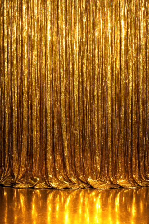 A shimmering gold curtain background