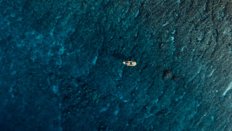 Kayaking in blue tropical ocean. Aerial view