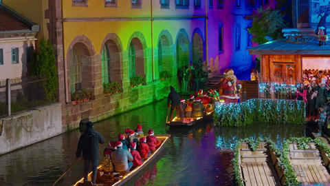 Colmar, France - 3.12.2025: Christmas boat show on a canal in Colmar's Little
